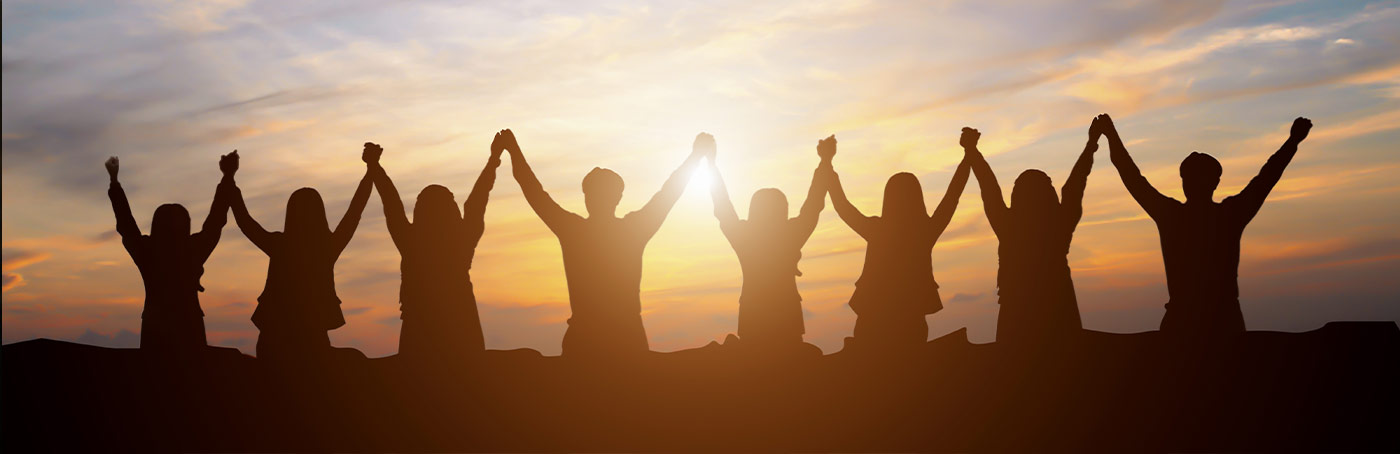 group of people holding hands