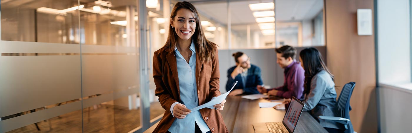woman standing in front of a conference room