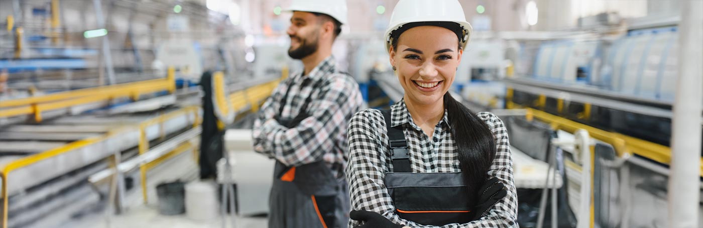 manufacturing employees wearing hard hats